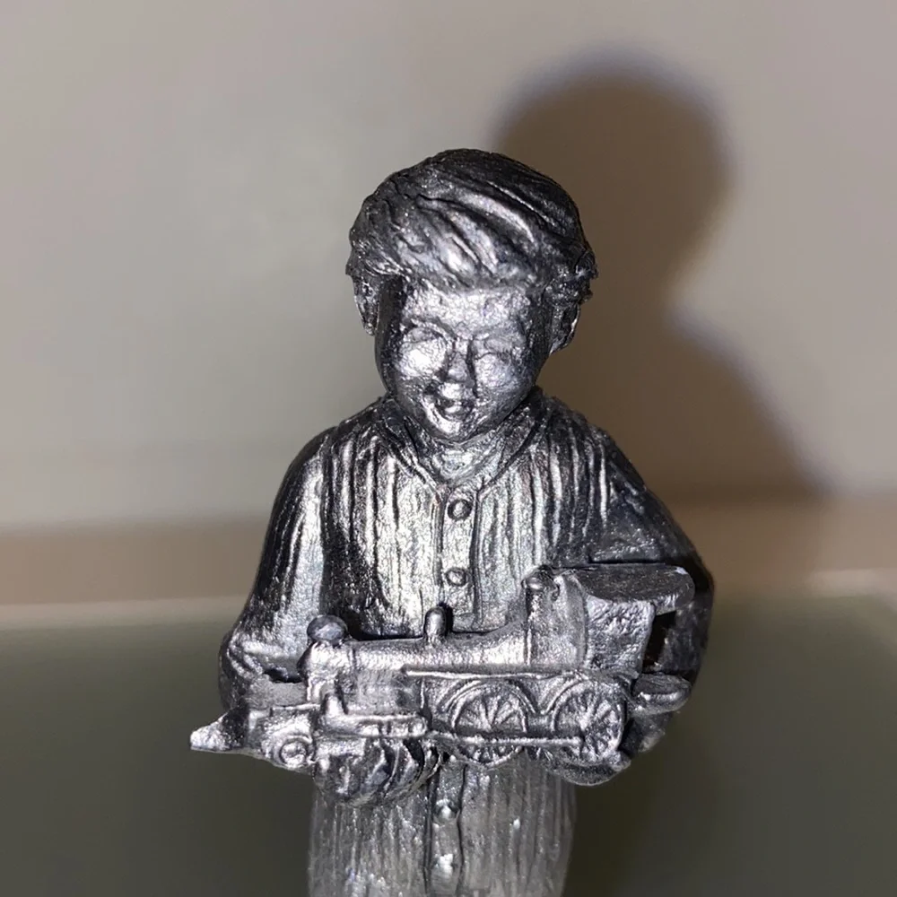 Michael Ricker Pewter Boy Holding Toy Train 3